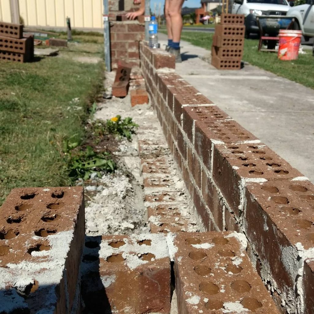 Building brick front fence